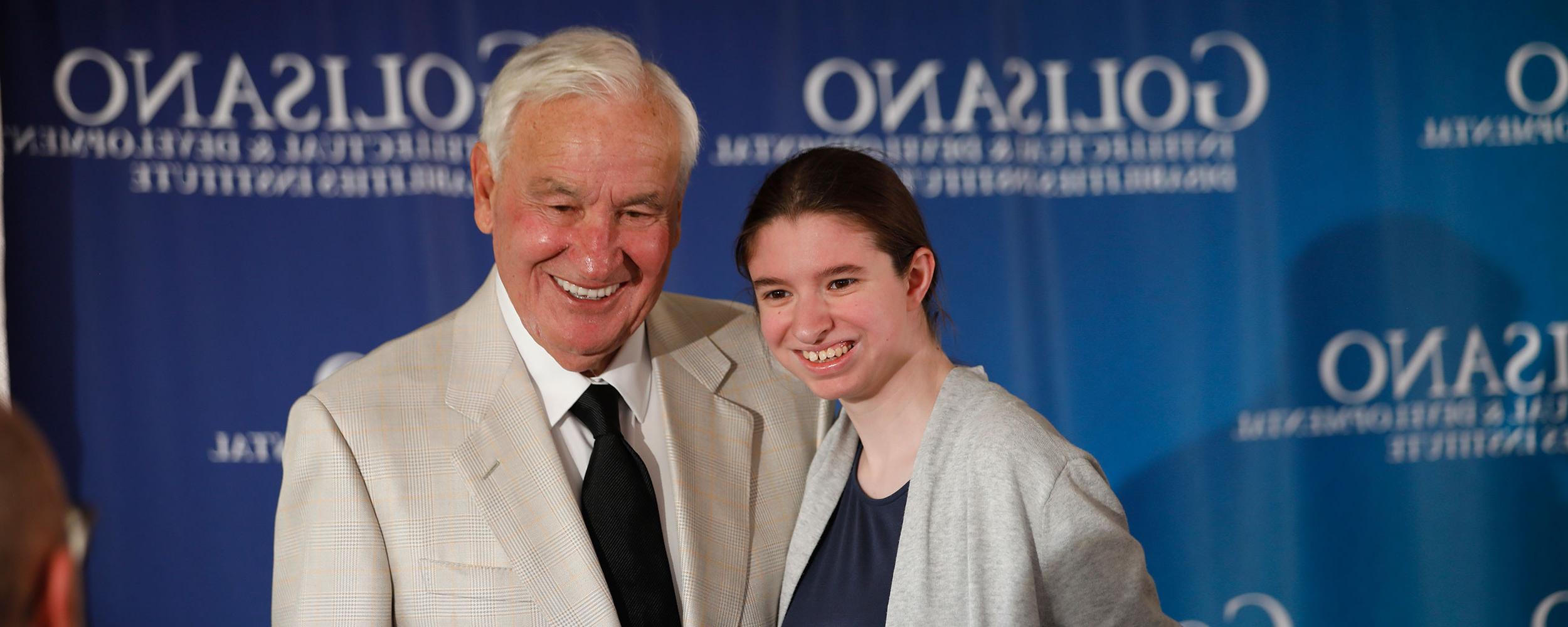 Tom Golisano poses for a picture with Shannon Salluzzo, 19, of Penfield, New York.